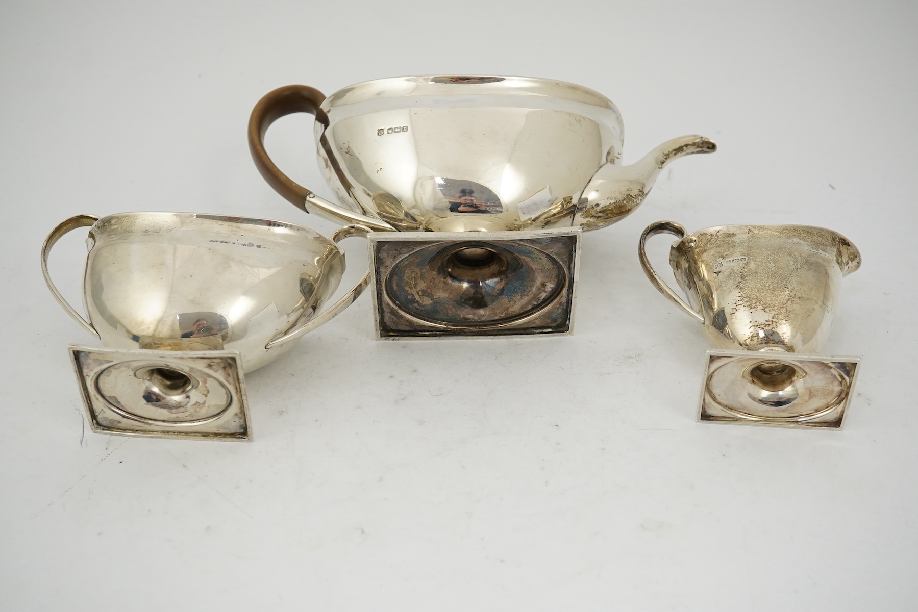 A George V silver three piece tea set by Fenton Brothers Ltd